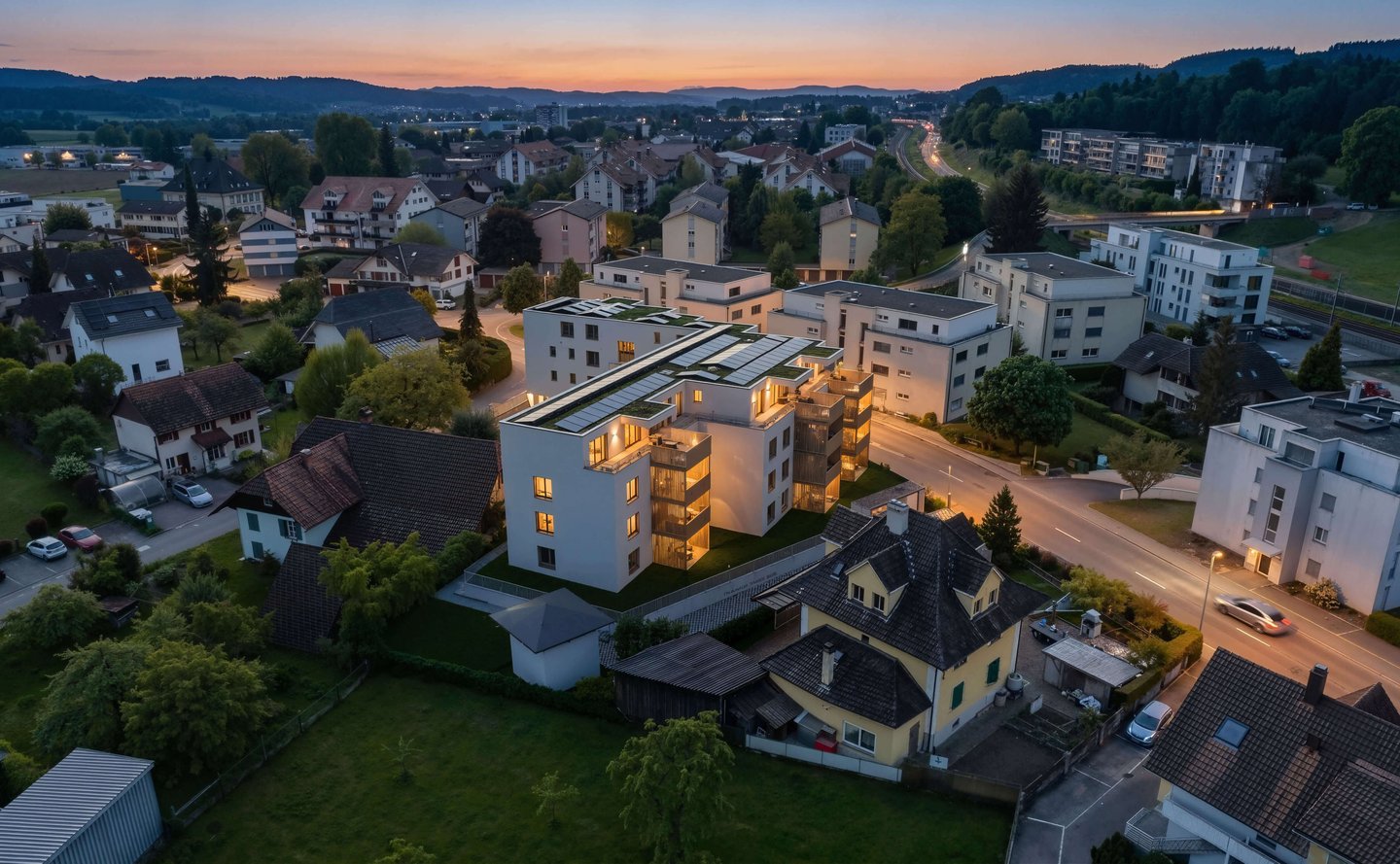 Visualisierung Mehrfamilienhaus bei Nacht